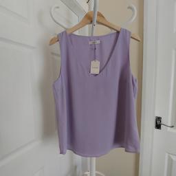 Blouse "Oasis"

Light Lilac Colour

 New With Tags

Actual size: cm and m

Length: 62 cm from front

Length: 63 cm from back

Length: 34 cm from armpit side

Shoulder width: 34 cm

Volume hands: 44 cm

Volume bust: 1.00 m – 1.01 m

Volume waist: 1.01 m – 1.03 m

Volume hips: 1.05 m – 1.06 m

Size: 16 (UK) Eur 42

Main: 100 % Polyester

Lining: 100 % Polyester

Made in China