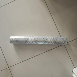 grey/silver patterned wallpaper 1 roll only would do chimney breast, cash on pickup.