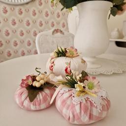 This lovely trio of pumpkins have been handmade with Laura Ashley pink and white gingham and bibi fabric.
They have been embellished with silk flowers & foliage and finished off with a cream satin ribbon.
They are hollowfibre filled and also with rice so they sit perfectly on a shelf or unit.
Would make a lovely gift for someone special.
From clean smoke and pet free home.