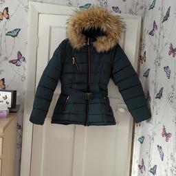 Apricot padded Quilted puffer Jacket
only worn a couple of times, in excellent condition.
size UK 14
Faux fur hood is removable.
comes from pet free home.