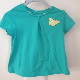 Zara Girl's T-Shirt, size; 9-12months. Teal  with yellow butterfly detail. Short sleeved t-shirt, with buttons up the back.
Excellent condition, only worn a handful of times. 

Safe collection available or delivery can be arranged for a small charge
Shipped within 24hrs if using Royal Mail or Yodel.