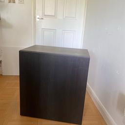 Ikea Besta shelf unit with door

Black-brown. 60x42x64 cm. Original item comes with one shelf at a total cost of £60. I have included an extra shelf. Small scratches at the top (see picture) but really neither here nor there. Selling for £25 in light of the above.