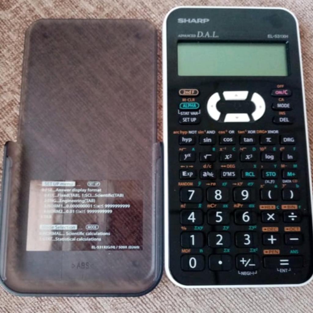 Sharp scientific calculator. Like new. Can be used for GCSE or A levels.