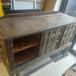 large solid sideboard, ideal for an upcycling project measuring 55" x 19.5" x 37"h.
I do have the missing door also. (already sprayed with primer).

sold as seen.

will need a large vehicle for transport. 
Collection from Trowbridge, Wiltshire.