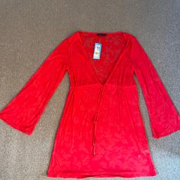 Beach dress M&S NEW with tag .
See through .

From pet and smoke free house
Pick up Norbury sw16

Check my other listing ->
Discount if you buy 2 or more