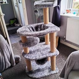 solid cat activity stand  3 tier with hammock, tunnel, resting bed at top with scratching posts
excellent condition 
9 months old 
hardly used.