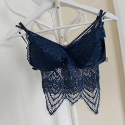 Bra “Apia’s” Bralette Bra

Soft Padded

Navy Colour

New With Tags

Adjustable Straps. Removable Bra Pads.

First Quality. Jaklošč pierwsza

Actual size: cm

Breast volume: 60 cm - 75 cm

Depth bust: 13.5 cm

Size: XL/XXL

Fabric: 90 % Nylon
 10 % Spandex

Lining: 95 % Bamboo Fibers
 5 % Spandex

Made in P.R.C

Made in China