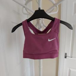 Bra “Nike” Swoosh Bra

 Dri-Fit Women's

 Lilac Colour

 New With Tags

Medium Support.

Made with at least 75 % recycled fibers,

which reduces waste and our carbon footprint.

Move To Zero is Nike's journey toward zero carbon

and zero waste to help protect the future of sport.

Actual size: cm

Breast volume: 60 cm - 65 cm

Size: XS

Body: 82 % Polyester
 18 % Elastane

Bottom Hem: 86 % Nylon/Polyamide
 14 % Elastane

Lining: 82 % Polyester
 18 % Elastane

Made in Sri Lanka

Retail Price £ 25.00, 28.00 € (Eur)
