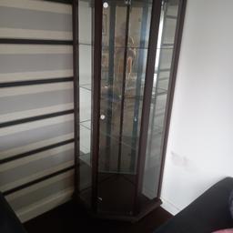Corner unit 4 glass shelves 1 door about
5 foot 9 inches tall FREE. 
Collection only.