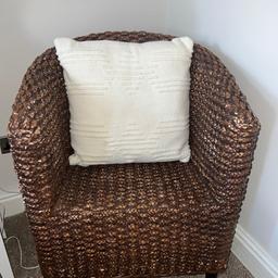 Cute rattan tub chair with cushion, perfect for lounge or bedroom