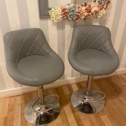 2 lovely grey bar stools £30 for the pair not selling separately fully working to go up and down little mark on one not tha noticeable might come off with a clean  can deliver locally for small fee to cover petrol or free pick up