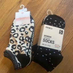 2 packs of brand new trainer socks. Size 4-8 
Mix of leopard print and dots.