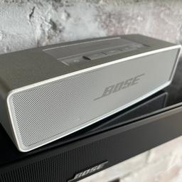 Bose Soundlink 2 Bluetooth speaker with amazing sound and battery life. I use it in my home gym and when I travel. Exceptional sound. Comes with charger and plug as pictured. No box.  No offers.
