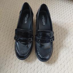 black heeled loafers with decorative tab metal buckle at the front new size 5