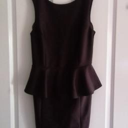 Ladies Black Topshop Peplum Dress

Size 14

Zip on back