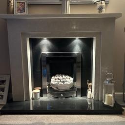 FOR SALE A STUNNING SOLID MARBLE FIRE SURROUND WITH A BLACK POLISHED GRANITE HEARTH AND BACKPANEL
THE SURROUND IS A SHINY LIGHT CREAM IN COLOUR WITH SWIRLY PATTERN IN THE MARBLE
COMES WITH WHITE DOWNLIGHTS UNDER THE MANTLE
SENSOR TOUCH SWITCH
AS NEW CONDITION

COMES WITH GAS FIRE THAT HAS ONLY BEEN USED 3-4 TIMES AND IS FULLY SERVICED

SIZES ARE OVERALL
HEIGHT 44"
WIDTH 54"
DEPTH 15"

FIREPLACE IS CURRENTLY STILL INSTALLED BUT WILL BE REMOVING TO INSTALL MEDIA WALL

COST OVER £1500 NEW AND IS STILL LIKE BRAND NEW

CASH ON COLLECTION FROM WV11 ESSINGTON

WILL REQUIRE 2 MEN TO LIFT AND A VAN