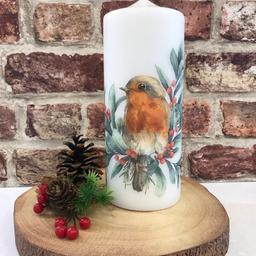 Handmade festive decor 
                            🎄🎄🎄🎄🎄🎄🎄
                    Beautiful Robin Red Breast 
     Surrounded with a garland of berries lambs          
                    ear and spruce foliage 
             Available only on the XL 20 cm 
Handmade decoupage decorative pillar candle 
                               Festive decor 

XL - 20 cm tall x 8 cm wide 
£9:99
Matching light up cosy light bottle lamps aldo available 
Free complimentary gift wrap 
Collection Darwen 
P&P available