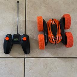4 wheeled, fancy tricks vehicle. Great fun as a first remote controlled toy! Uses 2 AA (remote) and 4 AAA (car) batteries. In good working condition. Collection only.
