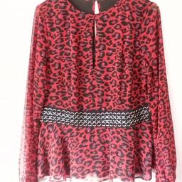Michelle Keegan Top UK16

Gorgeous leopard skin pattern with a sewn in elasticated bely with chain mail detail.

Clearing wardrobe out due to having baby.

Local collection preferred from a safe spot, Tesco Express Tulketh Mill PR2 2BT. Protects both seller & buyer.  

### For sent items-Any PayPal payments; buyer pays all fees or FULL payment sent as only fair.
 
I don't do bank transfers or Western Union.

Humblest of apologies.