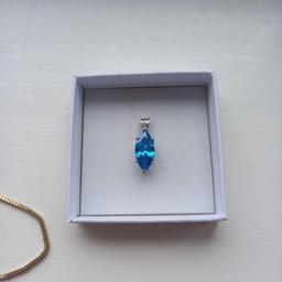 beautiful London blue topaz pendant set in 9ct white gold