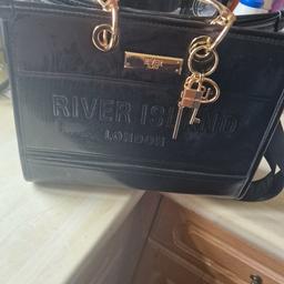 River island handbag in excellent condition only used 3 times. COLLECTION ONLY BOOTHTOWN NO STUPID OFFERS
