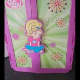 really good condition. polly pocket wardrobe, 5 dolls & lots of accessories.  hours of fun. one drawer missing, will add in, if I find it