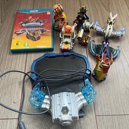 Wii U Skylanders Supercharged game, portal and figures for sale.
In good condition.