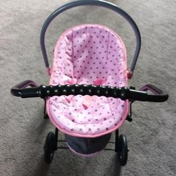 Has a tear in the pushchair as seen in picture, but can be fixed up. Comes with baby carrier. Good clean condition, just the tear