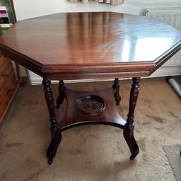 Antique Octagonal Table 74cm high / 83 cm wide
Lovely table with removable top and under tier carving
Legs on casters for easy moving
With table top removed - base measures 72cm high / 49cm wide
Collection only from WS4 Area of Walsall