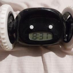PICK UP ONLY 
Moving alarm clock
Tells digital time. 
Just am and pm doesn't use 24 hour clock
Good condition no issues with it
Good for children or teens 
Uses none rechargeable battery but they last very long. 
Comes with original manual if wanted for free. 
 needs to be gone as soon as possible