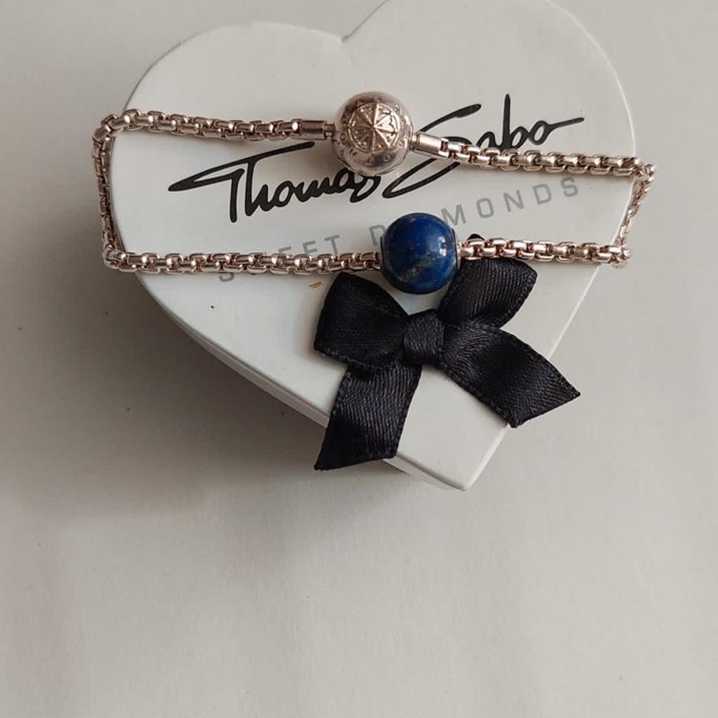 wunderschönes Original Thomas Armband mit Lapis Lazuli Charm aus 925er Silber.
Mit Original Verpackung. 19cm Lang

Wie auf den Fotos zu erkennen ist in einem sehr guten Zustand.
