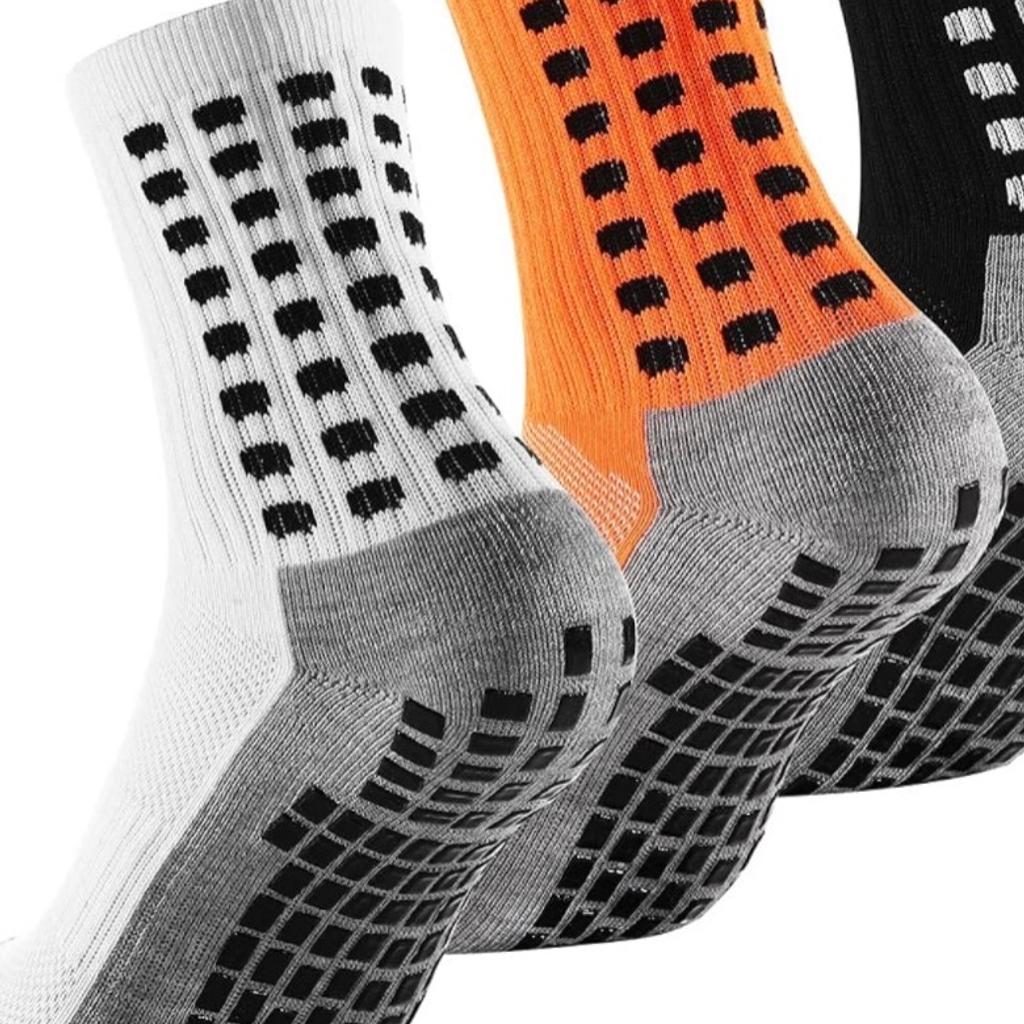 Quality / comfortable / multi-sport / performance socks for men / boys.
Suitable for football and other sports with its anti slip rubber grip soles and anti sweat soft cotton insoles
Prevent / reduce risk of blisters and excess rubbing during sports / exercise

2 pairs in bright white and orange

Size UK 5.5-11 (EU 39-45)
Cotton
Machine washable

 Get a grip on your sports game with these new Anti Slip Anti Blister Sports/Football Grip Socks in White/Orange. These socks come in two pairs and are perfect for a range of activities such as tennis, climbing, exercise, badminton, yoga, running, basketball, football, hiking and squash. The socks are made to fit UK sizes 5.5 to 11 and come in a crisp white and vibrant orange colour scheme that is sure to make a statement.
The socks are designed to offer a comfortable and secure fit.