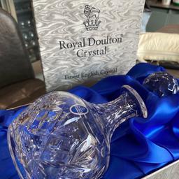 This lovely Royal Doulton finest English Crystal round decanter mint condition in the original box was a original wedding present been in the loft for 40 years
