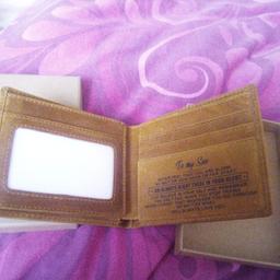 brown suede wallet with verse to "my son" . new in box.