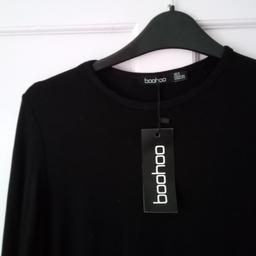 Boohoo UK 8 BLACK PLUS BASIC OVERSIZED DIP HEM 3/4 SLEEVE T-SHIRT.

A short sleeved, casual top which is comfortable, lightweight, and perfect for layering, this style is a classic staple no wardrobe is complete without. 

Made with extra fabric for the perfect fit, just pair with your fave jeans and chunky trainers and your off-duty look is sorted. Whether you're getting on board with the slogan trend or you're more about longline t-shirts.

Local collection preferred from a safe spot, Tesco Express Tulketh Mill PR2 2BT. Protects both seller & buyer.

Full payment by PayPal incl fees.

I don't do bank transfers or Western Union.

Humblest of apologies.
