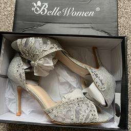 Brand new silver shoes 
Ideal for weddings or and other occasions. 
Size 4 
£11 ono