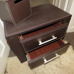solid faux leather chest of drawers  in good condition