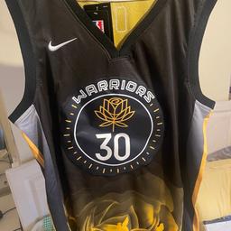 GSW special edition jersey. Size is XL but fits a L or M. Delivery only.