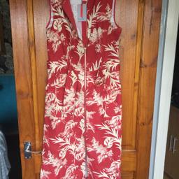 OASIS RED DRESS WITH FLOWERY PATTERN.SIZE 10.LONG SLIGHTLY STRETCHY.FULL LENGTH FRONT ZIP WITH BELT.NEW WITH TAGS.