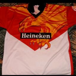 Very rare Sheffield Eagles shirt 1993-94 season. Good condition though has a few marks on the white part under chest/stomach area, collar worn too but not bad at all for it's age. Smoke free home. I don't post. Rotherham S61 Kimberworth Park.