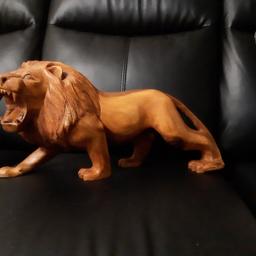solid wooden lion measurements w 19" h9-10" d 6-7" good condition collection only Aston B6