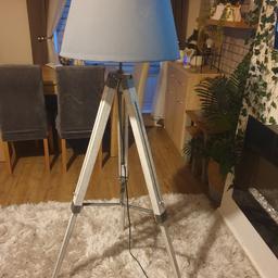 Good condition.
Tripod floor lamp bought for £30
When we were moving the lamp shade got slightly banged on one side which can be seen in the picture. Other than that its a nice lamp. Wooden legs.

Selling very cheap for £10.
Collection only
Legs are folded up and ready to go.