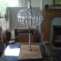 unique table lamp and display vintage effect lampshade , elm timber base , chrome pipework , bulb holder on and off switch plus inline on /off switch , generous 2 meter cable length ,pick up only Gargrave ,70 delivery possible re fuel charge