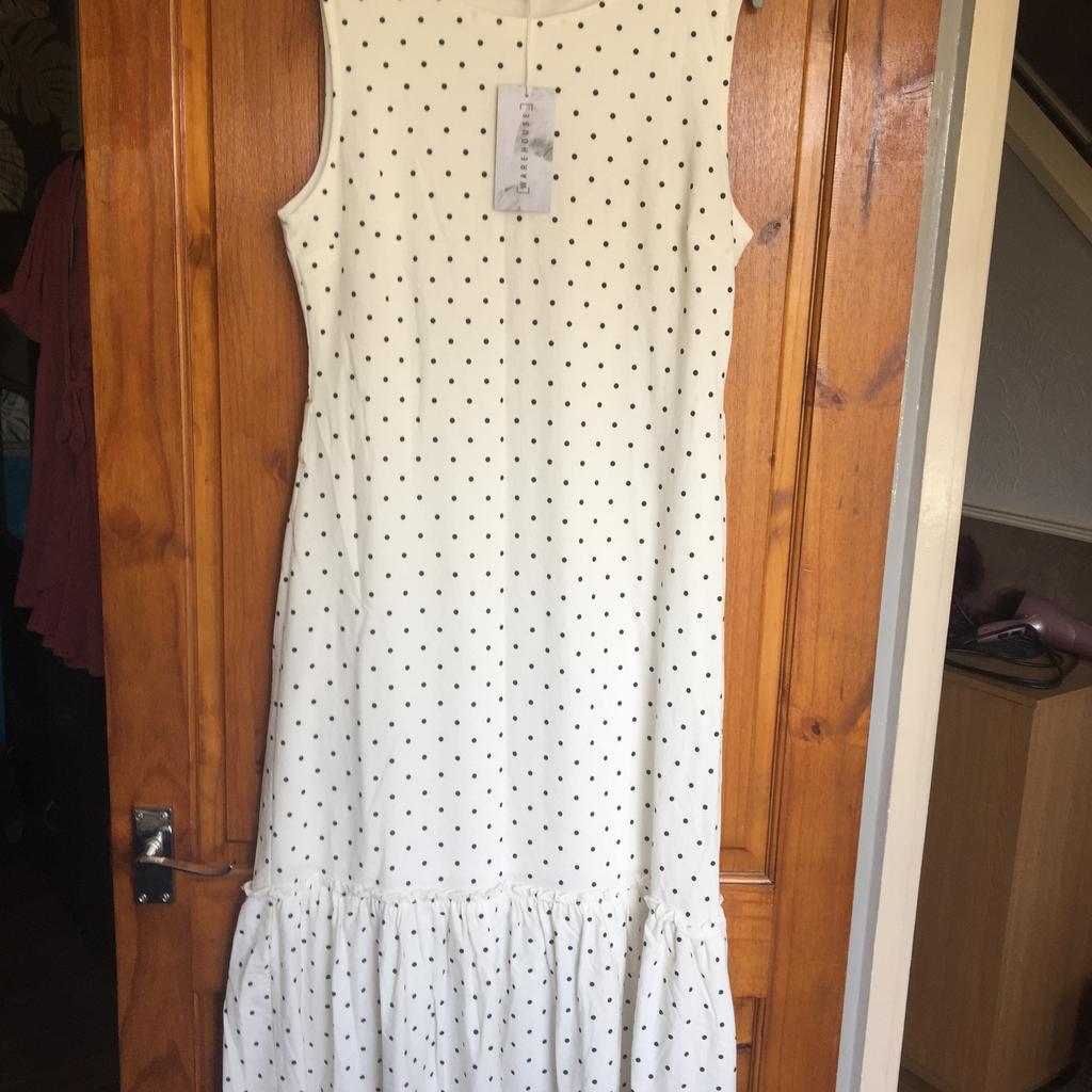 WAREHOUSE WHITE WITH BLACK POKER DOTS DRESS.SIZE 12.LONG WITH BELT.SLEEVELESS.LINED.NEW WITH TAGS.
