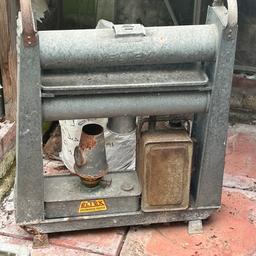Vintage sketch paraffin greenhouse heater with can ( as shown in photos). Mainly good only put fair due to some surface rust as expected for its age. Collection only