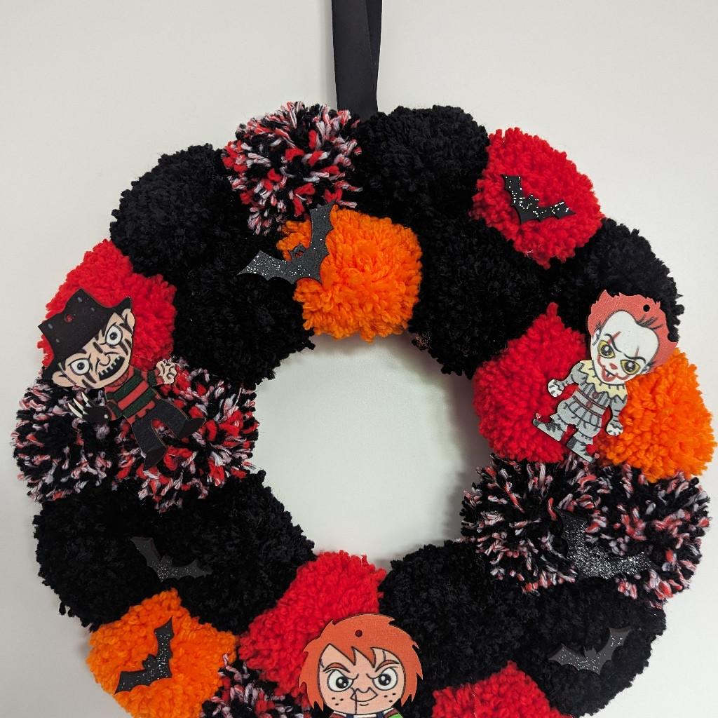 ❤️🧡🖤 Handmade Halloween Horror Characters wreath ~ Chucky, IT and Freddie Krueger
Red, orange and black pom poms with hand-painted glittery bats, horror character embellishments and a black satin ribbon as hook 🦇
13x12 inches, £18 🖤🧡❤️