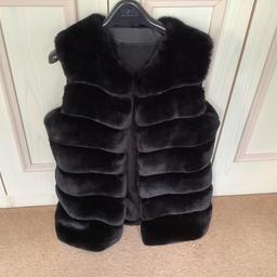 Good quality black faux fur Gilet
Never worn as changed mind after buying . Cost £60