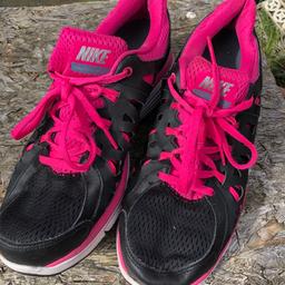 Nike dual fusion run trainers. Black and pink rare trainers . Like new hardly worn. Great items