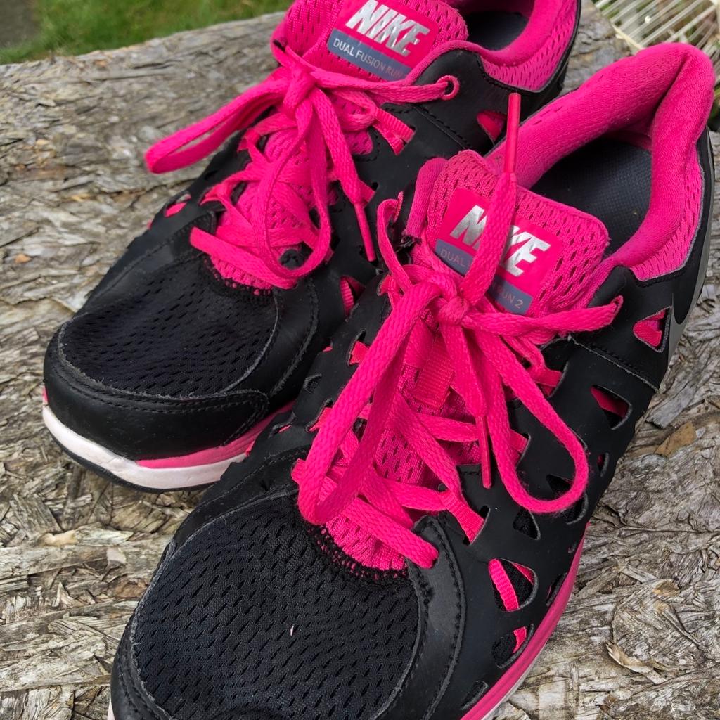 Nike dual fusion run trainers. Black and pink rare trainers . Like new hardly worn. Great items