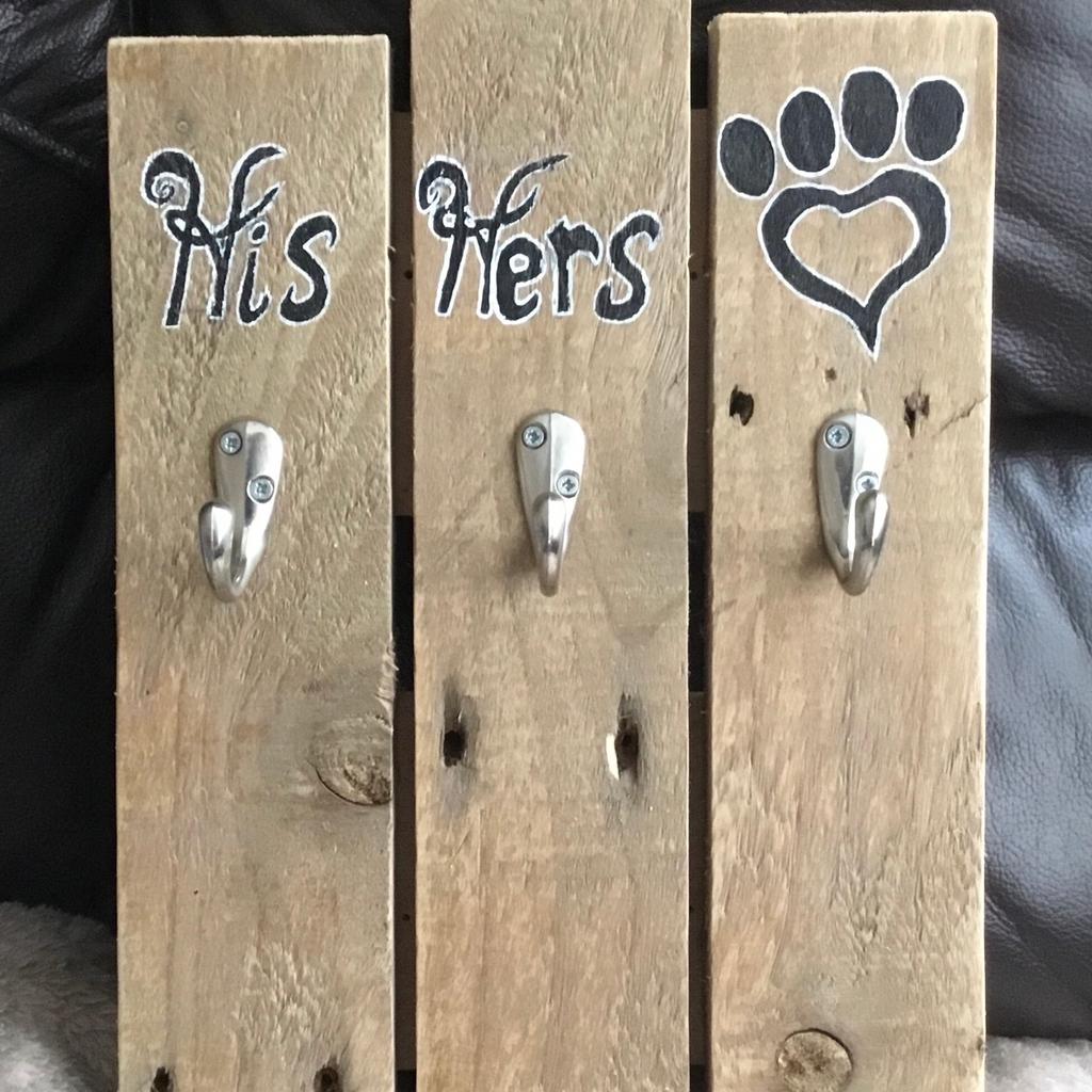 “His, Hers and Paws” Coat Hook and Pet Coats, Leads Hanger with 3 hooks, ideal for multiple coats and multiple leads also.

A stylish and eye catching storage solution for the humans of the house, ie your coats, hats, umbrellas etc and also your best friends coats, leads etc.

Cleverly created in a farmhouse style using reclaimed timber and therefore it has remnants left from its previous life ie, dents, nicks, nail holes, saw marks etc, will look stunning in any porch, hallway or cloakroom.

Measures approximately 16” high x 16” wide (overall).

Hand sanded and finished with a lustrous wax polish and with hand written signage.

Will grace any home and any decor or colour scheme and I’m betting it will be a very good talking point amongst family and friends.

Selling for just £17.00 or near offer

Cash on collection only.